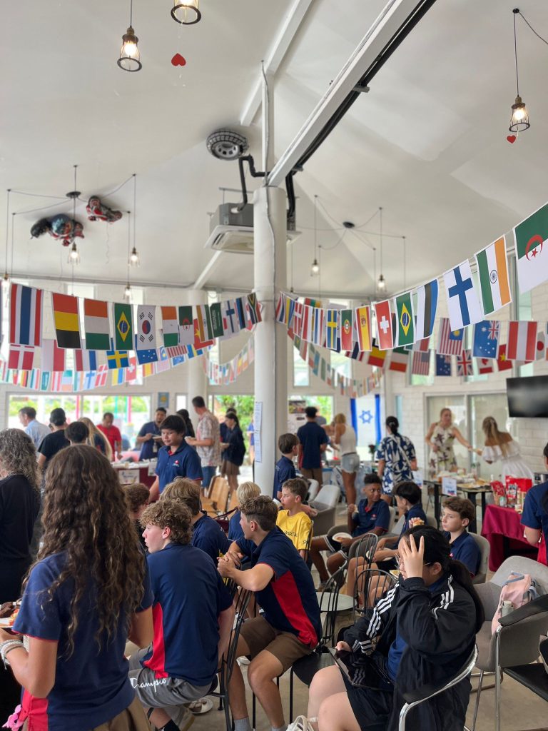 Flags of different countries hung in the cafeteria scaled