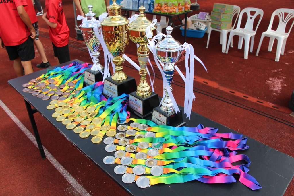 Medals and trophies for Sports Day 2025