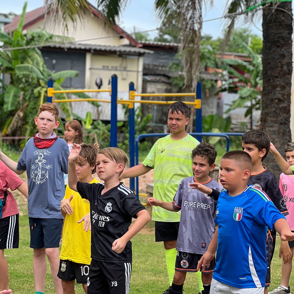 Children doing exercises before playing sports