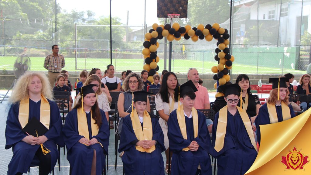 Graduates sitting down