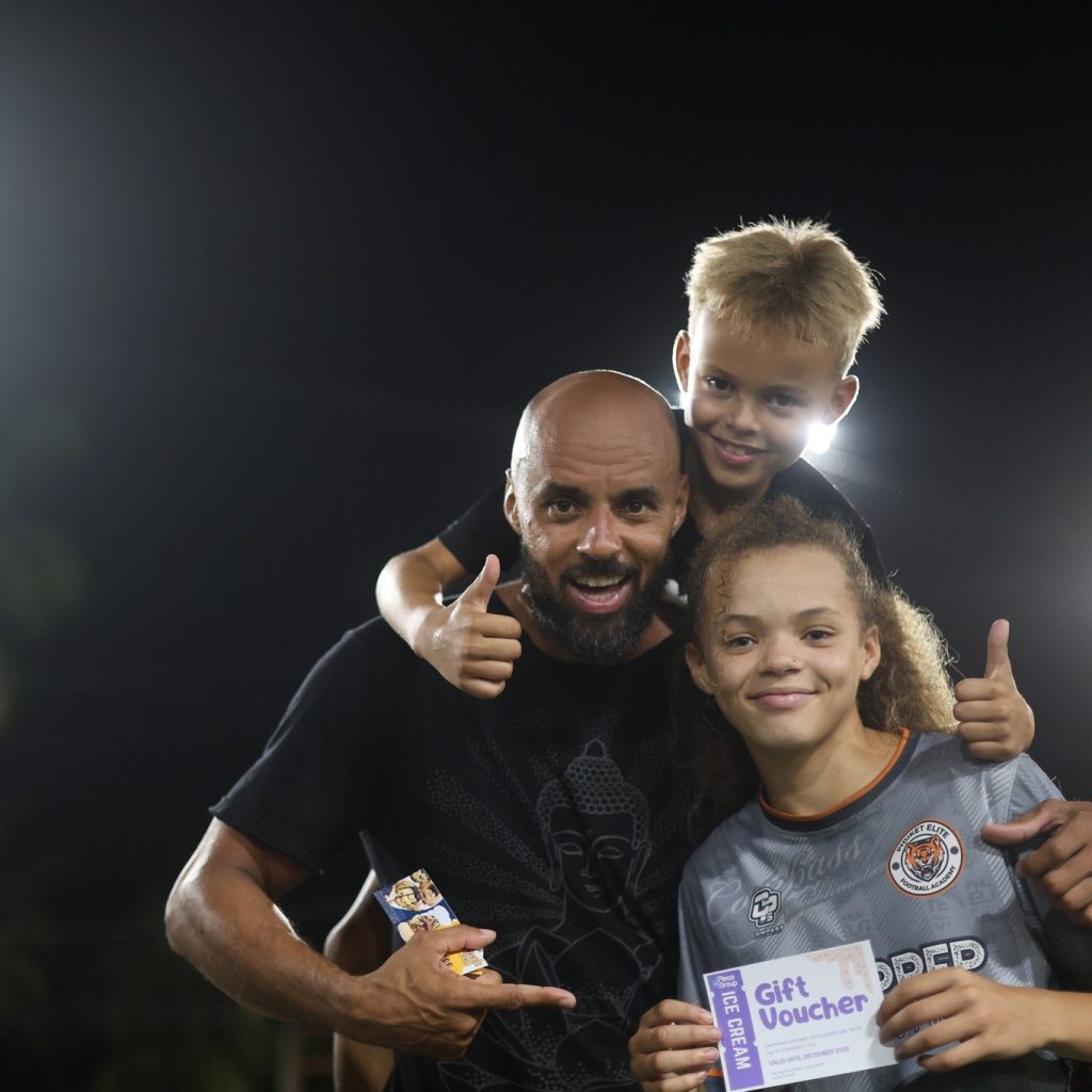 Coach with team players